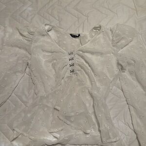 Elegant White Blouse with Floral Details